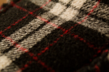 Fototapeta premium knitted wool slippers tartan pattern checked