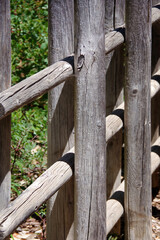 Full frame partial view of a fence made from heavy wooden logs
