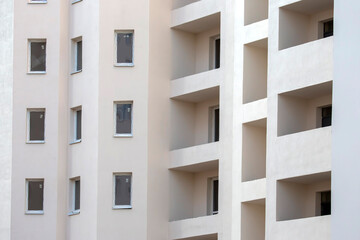 Facade of a new multi-story residential building. architecture and modern construction