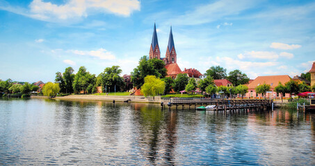 Neuruppin , Neuruppiner See with the monastery church Sankt Trinitatis in the background
