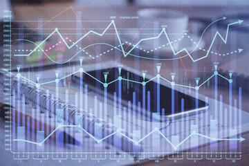 Double exposure of forex chart drawing and cell phone background. Concept of financial data analysis