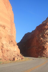 Empty road in the middle of the desert in Nevada crossing between two rocks blocks, , America, USA.
