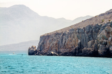 Fototapeta na wymiar Fjords with beautiful rocks near Khasab, Musandam, Gulf of Oman
