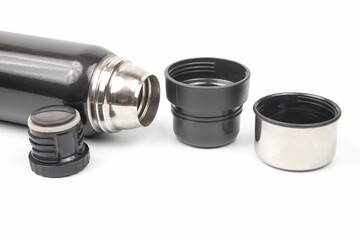 thermos for hot drinks with cups on white background