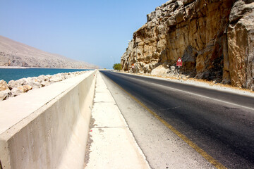 Road near to the Sea & mountain of Oman in a beautiful evening