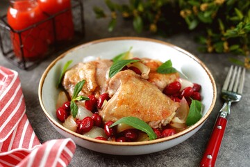 Chicken with Cornelian cherries, mint and onion.