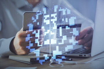 Double exposure of man hands holding a credit card and data theme drawing. E-commerce and...