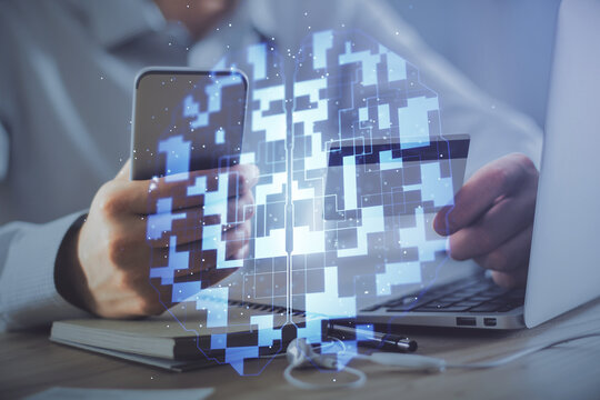 Double exposure of man hands holding a credit card and data theme drawing. E-commerce and technology concept.