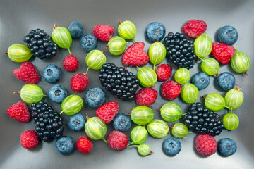 lots of fresh different berries. useful vitamin healthy food fruit. healthy vegetable breakfast