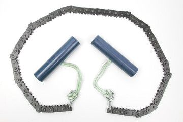 hand folding chain saw for wood on a white background. tool for tourism and camping.