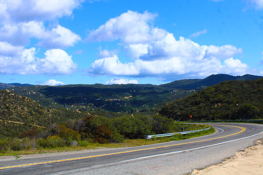 Mountains, clouds and blue skies at Ortega Falls in California