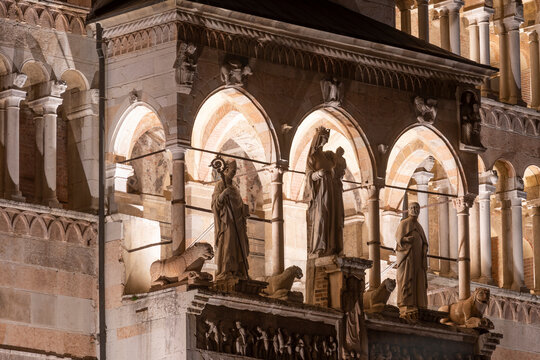 The statues of the Protiro (Sant'Omobono, Madonna with child and Sant'Imerio Bishop) of the Cathedral of Cremona, Italy