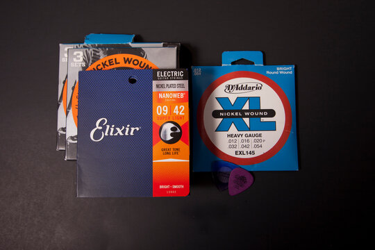  Collection of guitar strings and picks