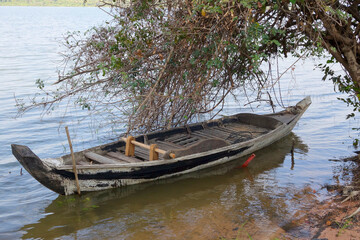 Rowing boat moored on the Mekong river near Lauang Prabang, Laos