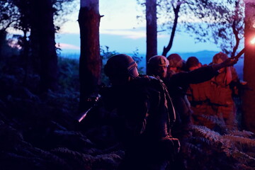 military squad in action rescue wounded soldier