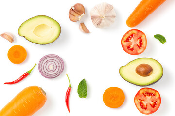 various vegetables and fruits isolated on white background, .topview of tomato slice, onion, Avocado, Mint leaves,Carrots and garlic