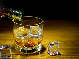 Low light photography whiskey and celebrate concept
