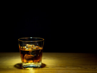 Low light photography whiskey and celebrate concept