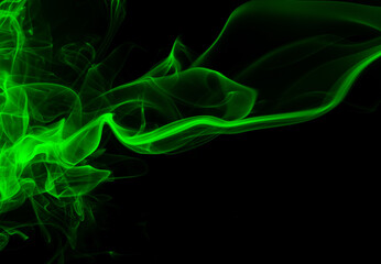 Green smoke abstract on black backgroud for design, darkness concept