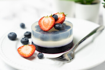 Mini blueberry fruit agar agar or jelly cake decorated with strawberry
