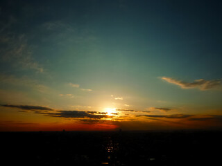 The sun changing a world color from light into darkness passes