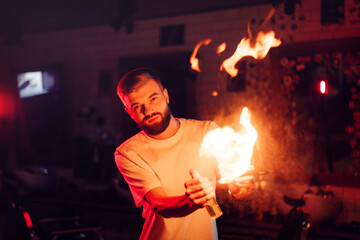 barber demonstrates fire for haircut with hot scissors