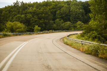 road street turns in the forest in Vrosina village Ioannina perfecture greece