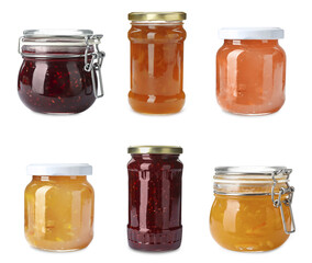 Set of jars with delicious jams on white background