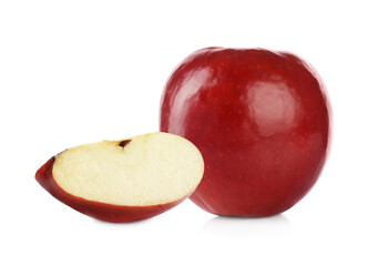 Cut and whole red apples on white background