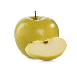 Cut and whole yellow apples on white background