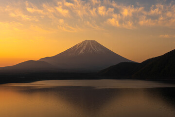 Mount Fuji over lake Motosu at sunset