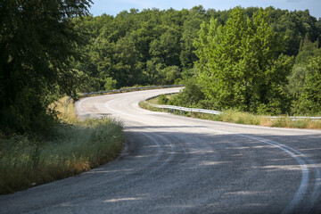 road street turns in the forest in Vrosina village Ioannina perfecture greece