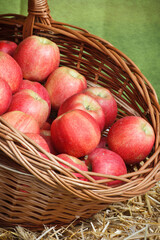 Fresh ripe apples in basket on stall at bazaar