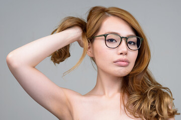 Portrait of young beautiful Asian woman shirtless