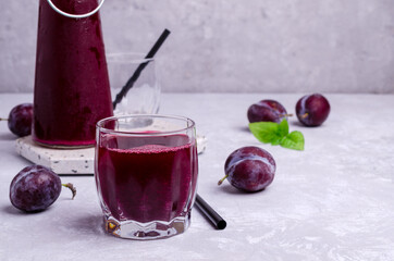 Red plum juice in glass