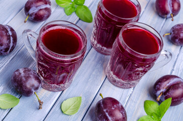 Red plum juice in glass
