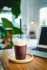 Layout in a loft style in dark colors open space interior view of various coffee Welcome open coffee shop background.