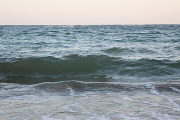 Water flowing on the beach