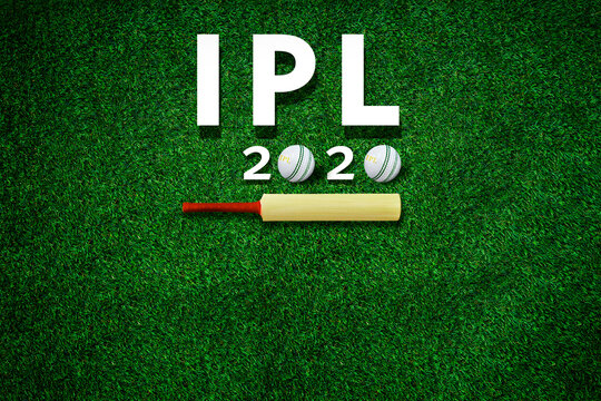 Cricket Bat And Leather Ball Resting On A Cricket Bat With Ipl 2020 Text Placed On Green Grass Cricket Ground Pitch,ipl 2020 Indian Premier League, UAE.