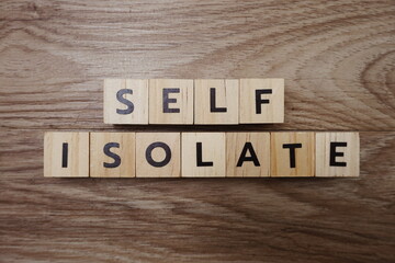 Fototapeta premium Self-Isolate alphabet letter on wooden background