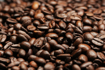 Roasted coffee beans background, Close Up mixture of different kinds of coffee beans.
