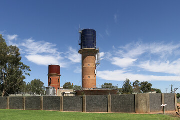 ROCHESTER, AUSTRALIA - February 29, 2020: The old water tower (brick with a cast iron tank) was used from the 1880s to 1914 when a new concrete tower replaced it.