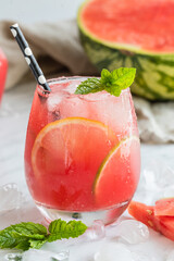 A watermelon drink watermelon, lemon, lime, mint and ice