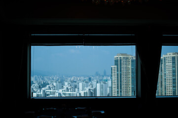 Fototapeta na wymiar the cityscape outside the window