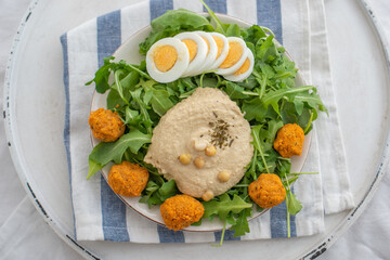 healthy home made avocado hummus salad bowl