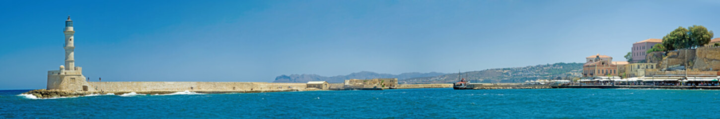 Fototapeta na wymiar The giant panorama of Chania embankment with old lighthouse on Crete, Greece