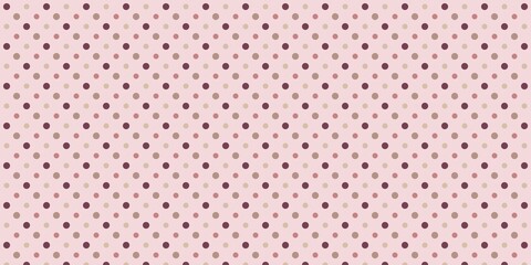 互い違いに配置された大きさと色の異なるドット模様