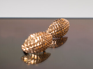 Closeup shot of golden earrings.