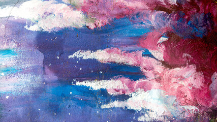 Abstract creative background of chaotic strokes of old cracked paint on concrete wall. Old surface with traces of paint, weathered, scratches and cracks for design