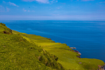 The coastal landscape at Isle of Skye, a big island in north highlands, Scotland, on a sunny day.